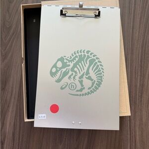 Hidden NY Homeware Aluminum Clipboard / Document Holder – Dinosaur Logo
